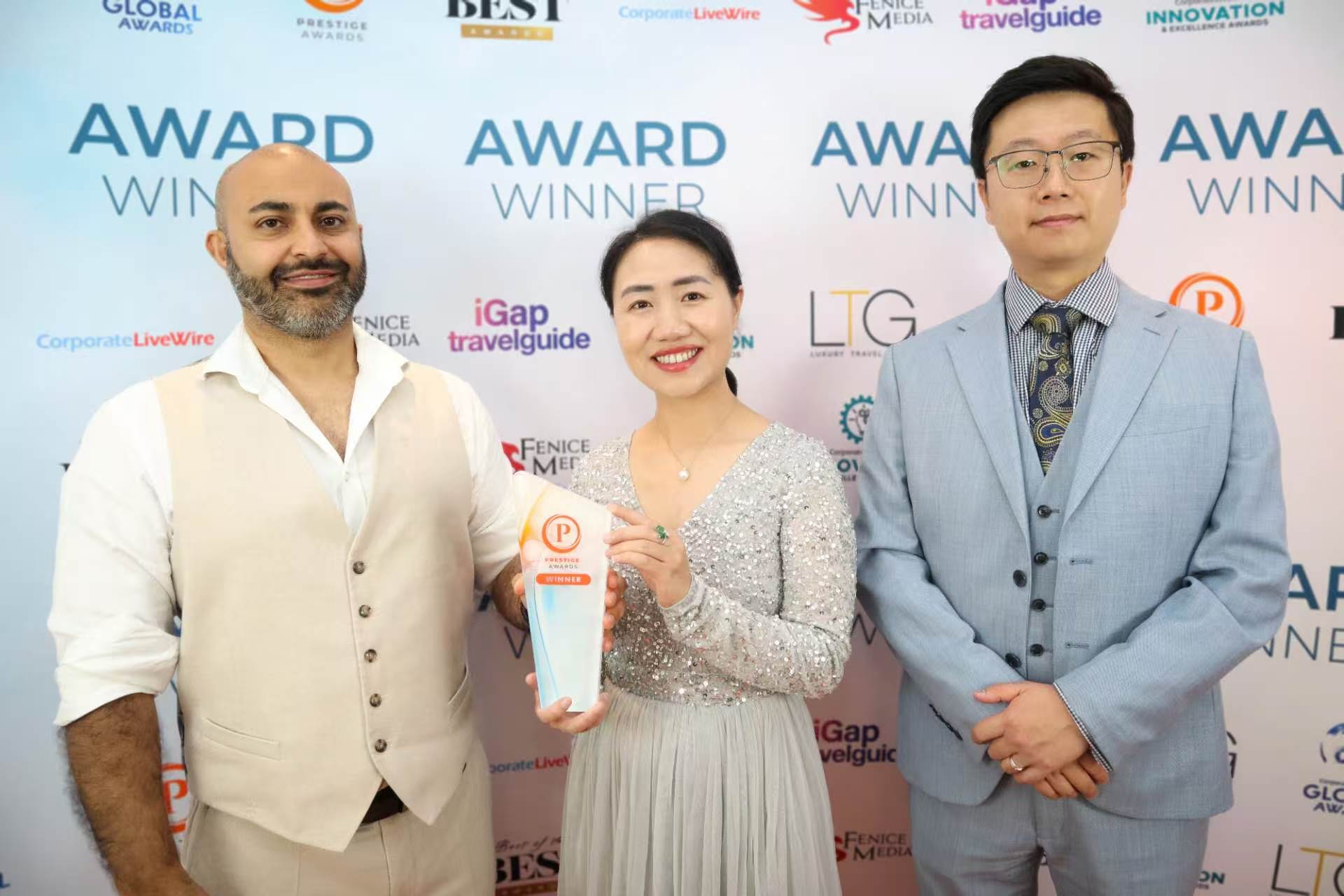 Yingqi (Ann) Zhu and a Gogetop Marketing colleague with Osmaan Mahmood, Founder & CEO of Fenice .jpg