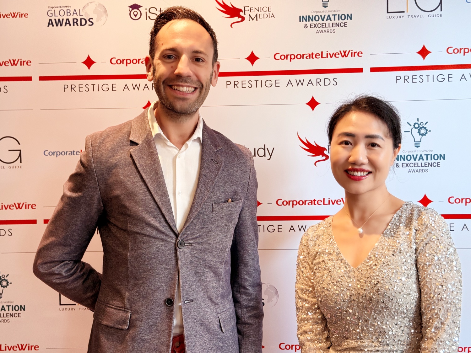 Yingqi Ann Zhu with James Drakeford, Editor-in-Chief, at the South England Prestige Awards 2026 .jpg
